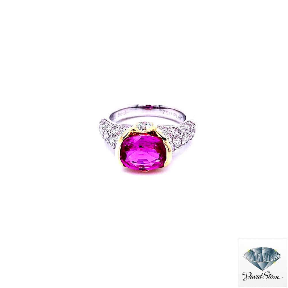 David Stern Jewelers presents an exceptional 2.25 CT Oval Faceted Ruby Couture Ring set in platinum and 14kt Yellow Gold