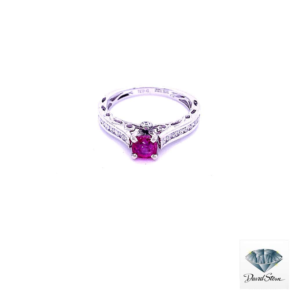 Elegant sterling silver ring with a vibrant pink gemstone and diamond accents, perfect for engagement or special occasions. Crafted by trusted jewelry experts at David Stern Jewelers.