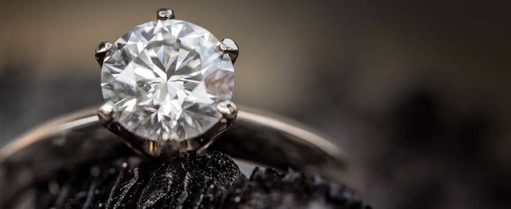 A stunning diamond engagement ring showcasing a large, brilliant-cut solitaire diamond set in platinum, emphasizing luxury and high-quality jewelry from david stern jewelers.