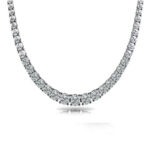 Elegant diamond tennis necklace featuring sparkling round cut diamonds set in platinum, perfect for luxury jewelry collections and special occasions.