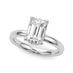 Elegant diamond engagement ring with an emerald cut center stone and platinum band from David Stern Jewelers.