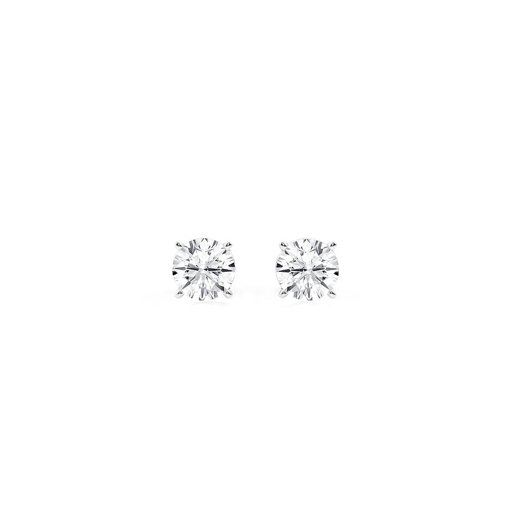 Round cut diamond stud earrings, timeless and elegant jewelry piece for women. Perfect for gifting or everyday wear, showcasing high-quality, stunning diamond craftsmanship.