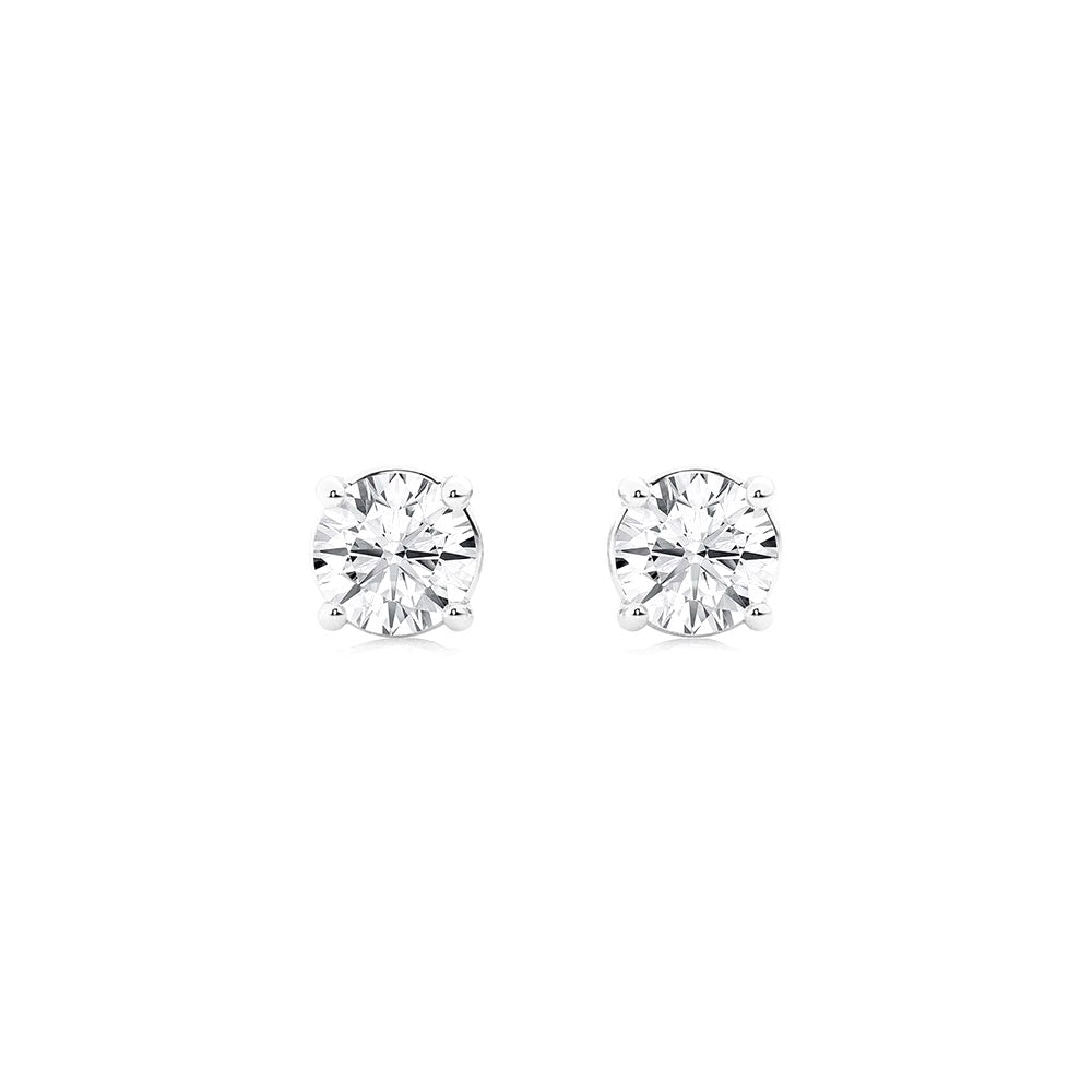 Bright diamond stud earrings, 14k white gold, perfect for engagement and everyday jewelry, timeless and elegant jewelry gift idea from David Stern Jewelers.
