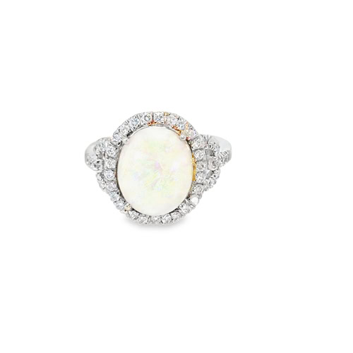 Oval opal halo ring seen head on: a 4.50 ct white opal cabochon inside a round diamond halo in 14kt white gold
