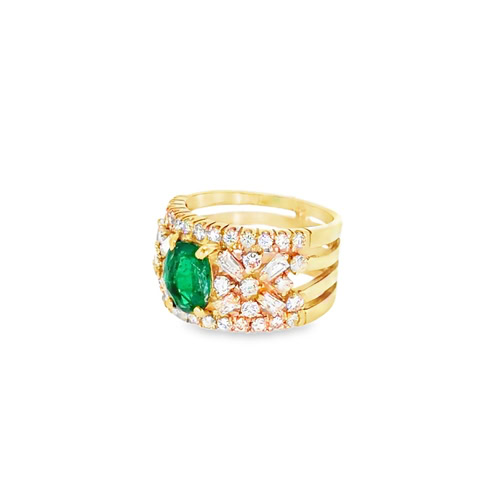 Side view of the wide band emerald ring, showing the four open gold bands and the diamond pattern across the top