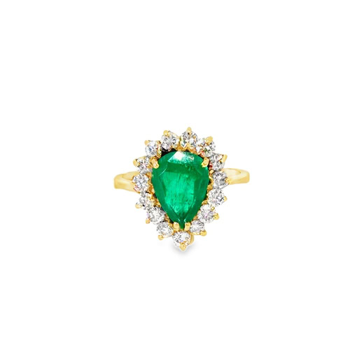 Pear emerald ring seen head on: a 2.00 ct pear shaped emerald inside a halo of round diamonds in 18kt yellow gold
