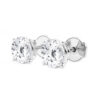 Side view of the white gold diamond studs showing the four-prong baskets and screw-style backs