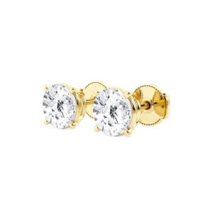 Side view of the yellow gold lab grown studs showing the four-prong baskets and screw-style backs