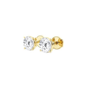 Side view of the yellow gold lab diamond studs showing the four-prong baskets and screw-style backs