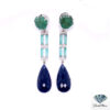 Sapphire and emerald earrings: sliced emerald tops, emerald baguette ladders and faceted pear sapphire drops in 18kt white gold