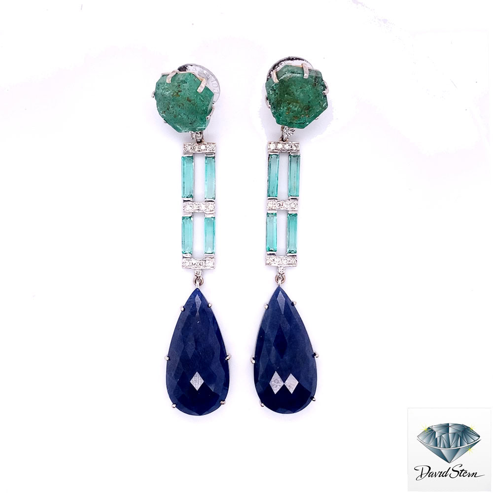 Sapphire and emerald earrings: sliced emerald tops, emerald baguette ladders and faceted pear sapphire drops in 18kt white gold