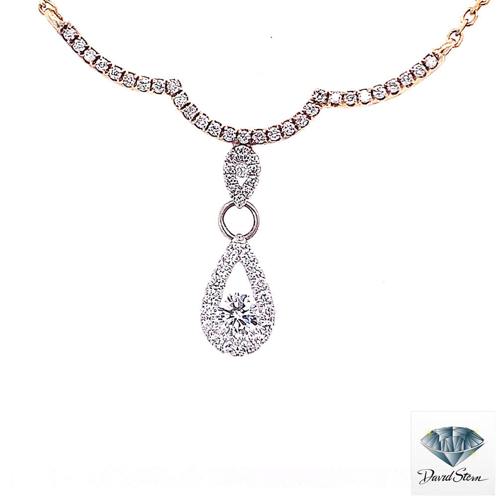 Diamond teardrop necklace: pave open teardrop with a round center diamond below a scalloped diamond row, 14kt yellow gold