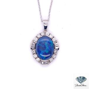 Opal doublet pendant: 2.00 CT blue green opal doublet in a halo of round and baguette diamonds, 14kt white gold