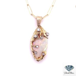 White opal pendant: 5.10 CT marquise double cabochon opal held by organic yellow gold branches with seven diamonds