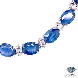 White gold sapphire necklace: diamond accents set between the sapphires