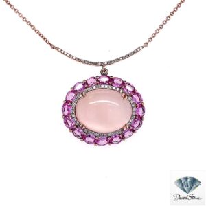 Rose quartz necklace: oval cabochon rose quartz with a diamond halo and pink gemstone halo in 14kt rose gold