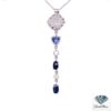 Tanzanite and sapphire pendant: pave diamond cluster, trillion tanzanite, bezel diamonds and oval sapphires in a 14kt white gold drop