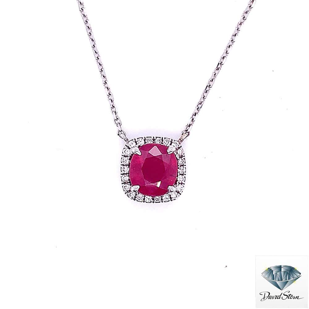 Ruby necklace: 2.50 CT cushion cut ruby in a diamond halo, 14kt white gold