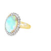 Side view of the two tone opal ring showing the white gold diamond halo head and the 14kt yellow gold shank