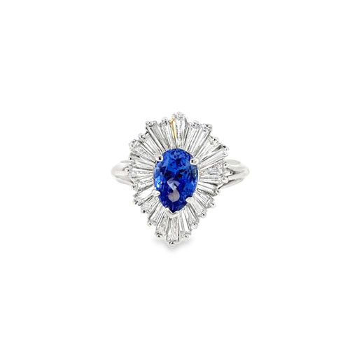 Sapphire ballerina ring: 1.81 CT pear sapphire framed by tapered baguette diamonds in 18kt white gold