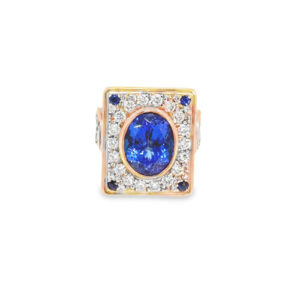 Tanzanite couture ring: a 6.38 ct oval tanzanite bezel set in rose gold inside a rectangular diamond and sapphire plaque, on an 18kt white, rose and yellow gold band