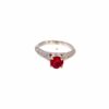 The 0.90 ct round ruby in four prongs on its 14kt white gold pave band, the opening frame of its 360 degree video