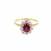 The vintage ruby framed by old cut diamonds in 18kt yellow gold, the opening frame of its 360 degree video