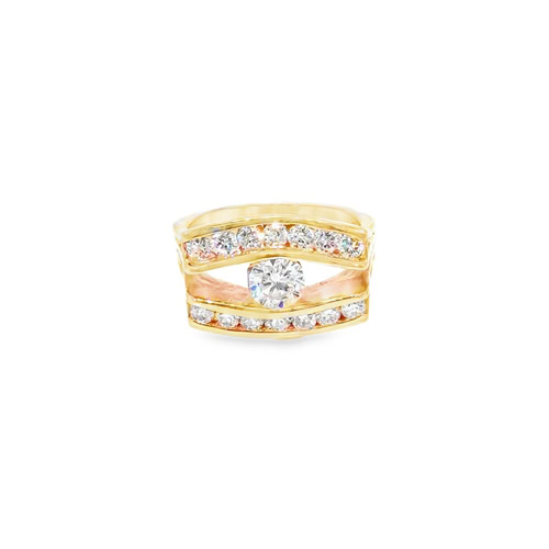 Wide band engagement ring: 0.70 ct round diamond between two curving channel-set rows of diamonds in 14kt yellow gold
